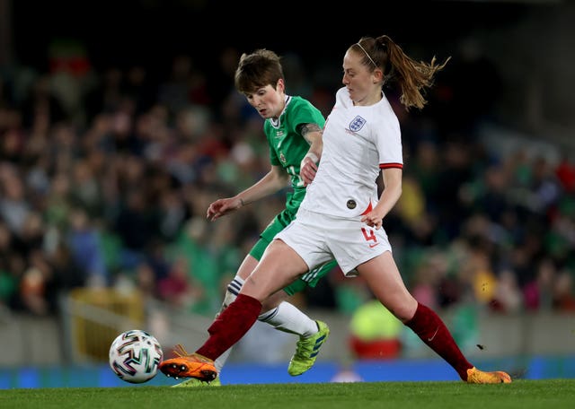 Kirsty McGuinness, left, played in Northern Ireland's 5-0 World Cup qualifying defeat to England in April