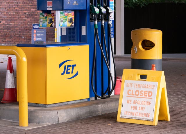 A closed sign on the forecourt of a petrol station in Leed