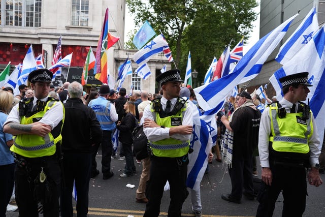 Police and protesters at a pro-Israeli demonstration in central London 