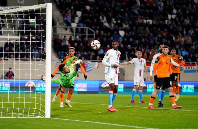 Luxembourg goalkeeper Ralph Schon makes a save 