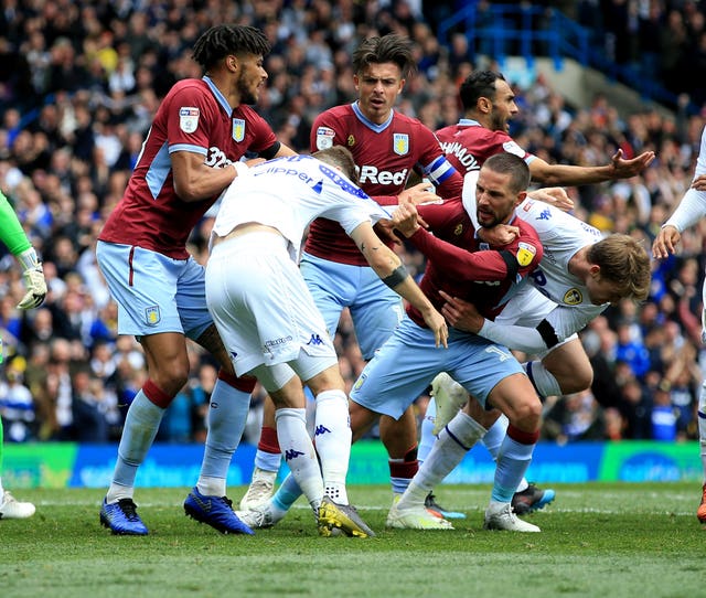 Leeds’ Mateusz Klich is confronted by Aston Villa players during last season's match