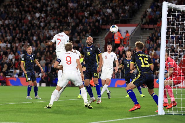 Raheem Sterling (second left) scores England's equaliser