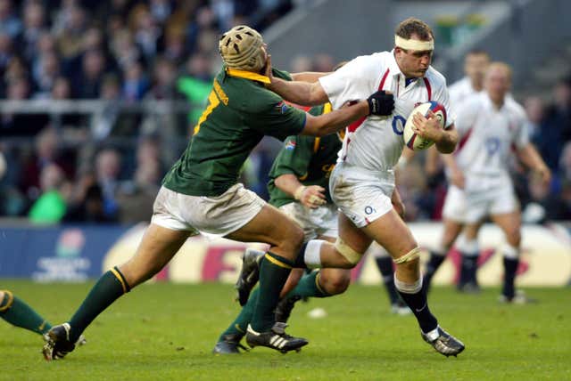 South Africa’s Pedrie Wannenburg (left) tackles England's Richard Hill
