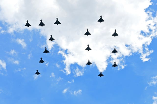 Fighter jets from the RAF fly in formation to form the number 70