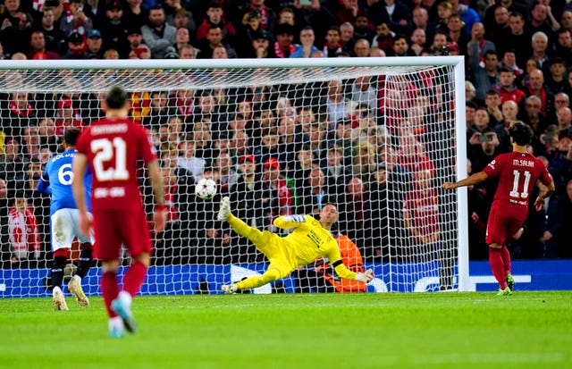 Mohamed Salah, right, scores Liverpool's second goal from the penalty spot