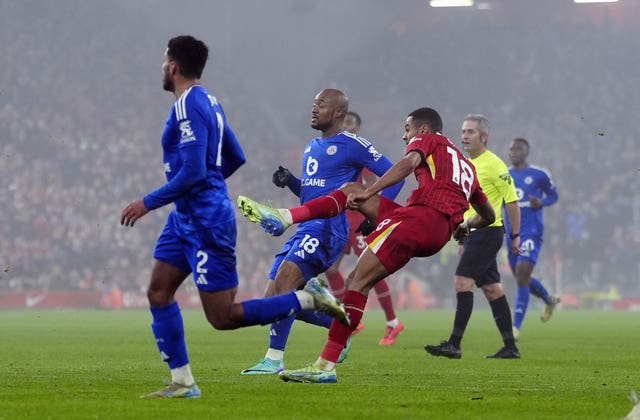 Cody Gakpo, right, curls in Liverpool’s first goal against Leicester