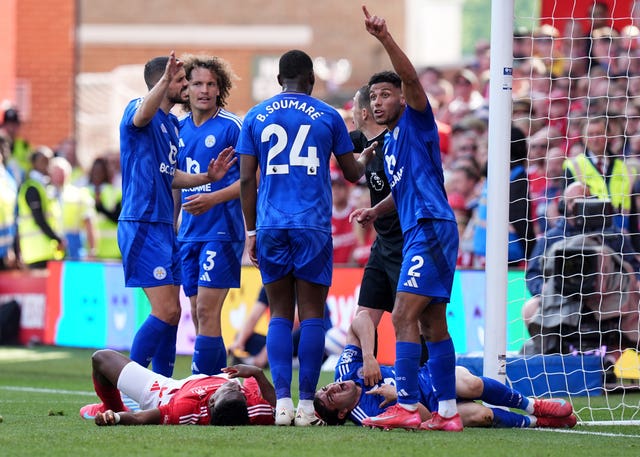 Taiwo Awoniyi lays on the floor