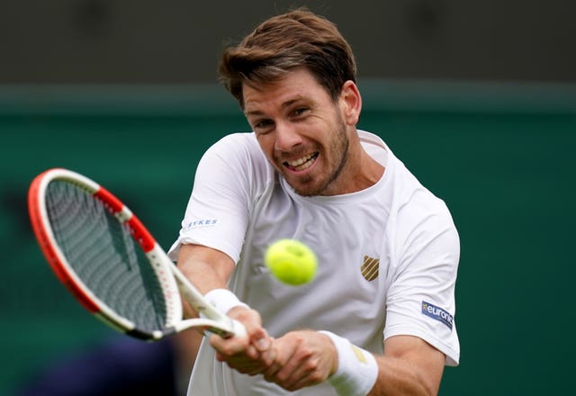 Cameron Norrie hits a backhand against Lucas Pouille