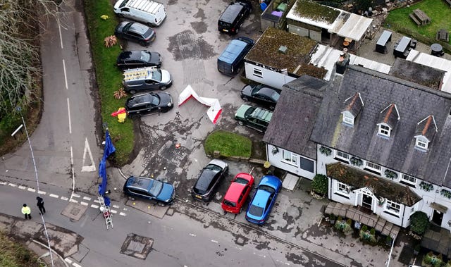 Aerial view of a police cordon outside a pub