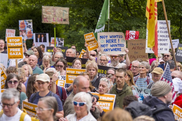 People take part in a Stop Trump Scotland protest outside the US consulate in Edinburgh