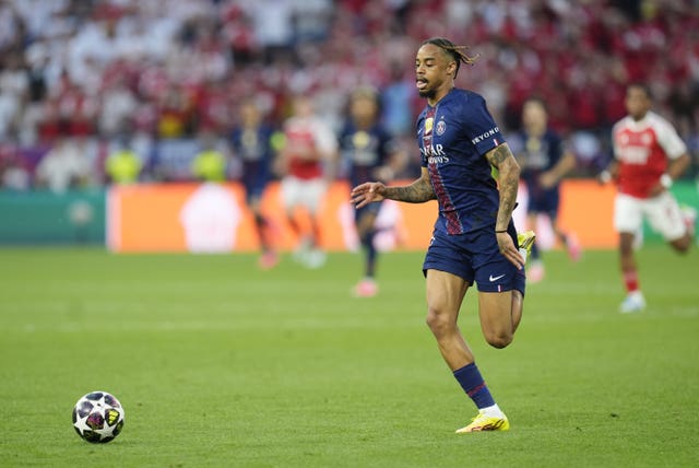 Paris St Germain's Bradley Barcola runs after a ball