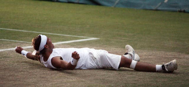 Nadal celebrates his 2008 Wimbledon win over Roger Federer