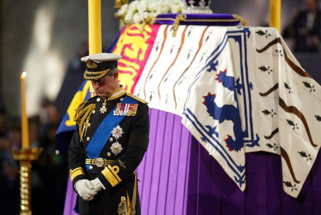 The Prince of Wales stands vigil beside the Queen Mother’s coffin while it lies in state at Westminster Hall