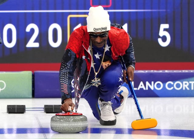 American rapper Snoop Dogg practices curling 
