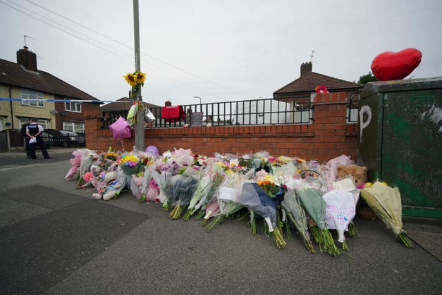 Flowers are left near to the scene of Olivia Pratt-Korbel's death 