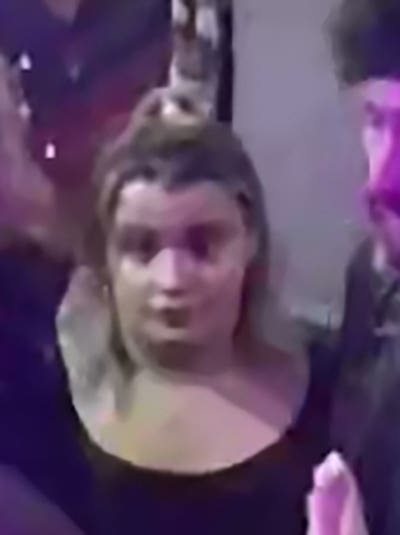 CCTV still of a woman who police would want to speak to