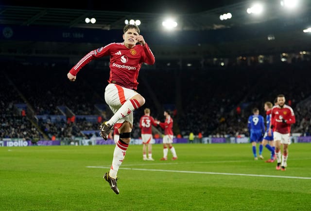 Alejandro Garnacho celebrates by jumping in the air