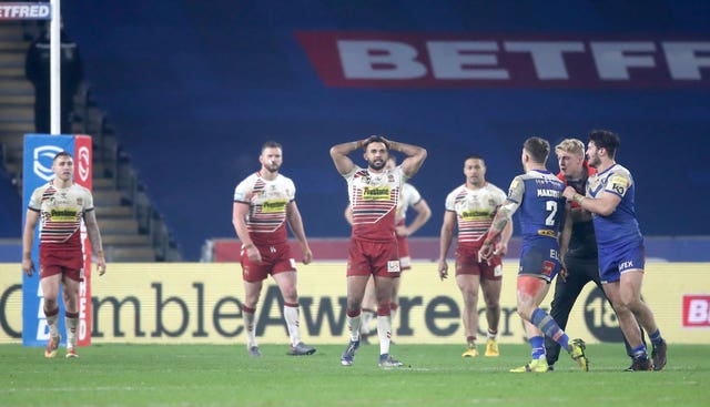Wigan players show their disappointment at losing