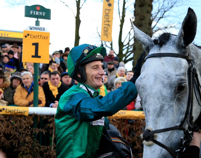 Daryl Jacob gives Bristol De Mai a well-deserved pat after the Betfair Chase