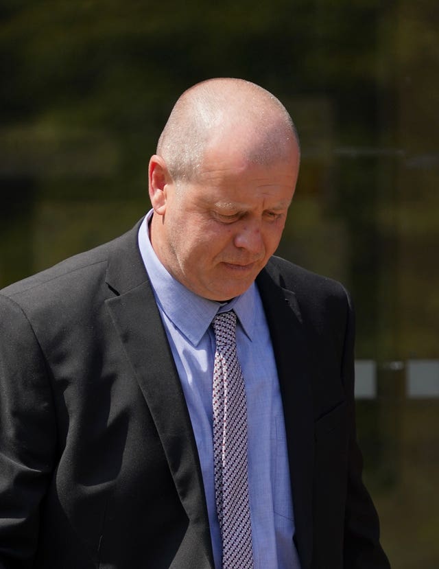 Stewart Powell, with his head slightly bowed, leaving Folkestone Magistrates’ Court