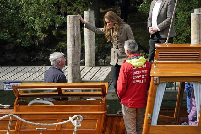 Kate gets on a boat