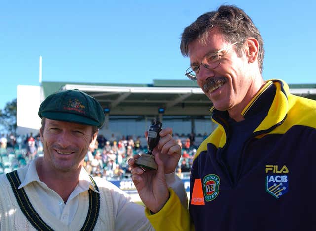 Former Australia coach John Buchanan (right) celebrates an Ashes win with Steve Waugh.