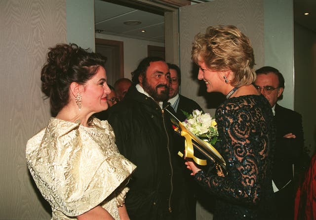 Diana chats with singer Luciano Pavarotti (centre) at a Concert of Hope raising funds for Ty Hafan Hospice in 1995 