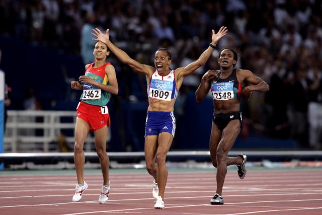 Dame Kelly Holmes celebrates winning 800m gold in 2004