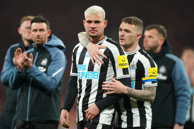 Newcastle’s Bruno Guimaraes (left) and Kieran Trippier look dejected after the Carabao Cup final defeat by Manchester United