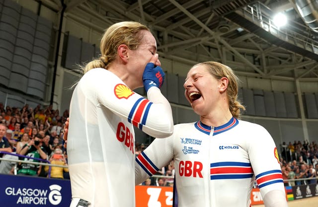 Neah Evans, right, and Elinor Barker celebrate winning gold in the Women’s Elite Madison at the 2023 UCI Cycling World Championships