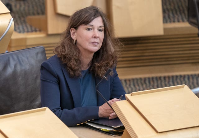 Lord Advocate Dorothy Bain KC seated in Holyrood
