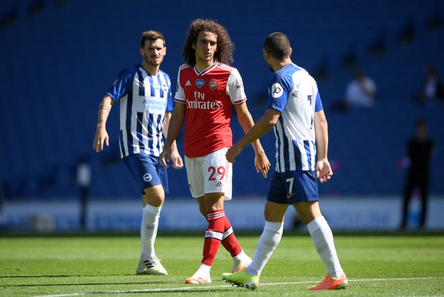 Matteo Guendouzi, left, argues with Brighton forward Neal Maupay
