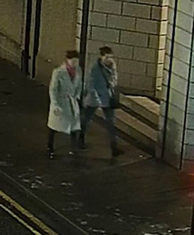 Image taken from CCTV footage of the Huszti sisters walking along a pavement