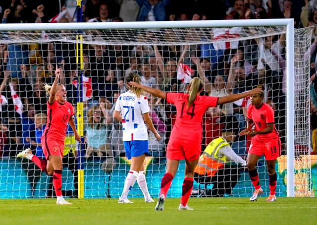 Beth Mead, left, celebrates scoring their side’s fifth goal against the Netherlands in June 2022