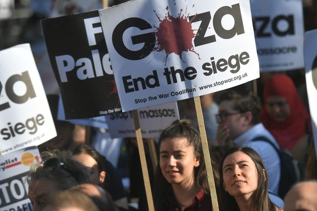 Protesters attend a rally on Whitehall in central London after more than 60 Palestinians were killed and about 2,000 injured by Israeli forces (Victoria Jones/PA)