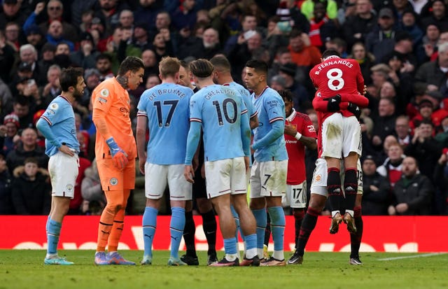 Manchester City players surround referee Stuart Attwell as Manchester United celebrate Bruno Fernandes' contentious equaliser in January's derby at Old Trafford. Controversy erupted after Fernandes’ goal was allowed to stand, despite Marcus Rashford having been in an offside position, and appearing to race on to Casemiro’s through-ball, in the build-up. Rashford compounded City’s frustration by grabbing a late winner in a 2-1 success for the hosts