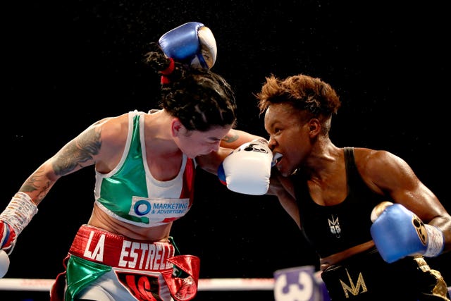 Nicola Adams, right, has hung up her gloves