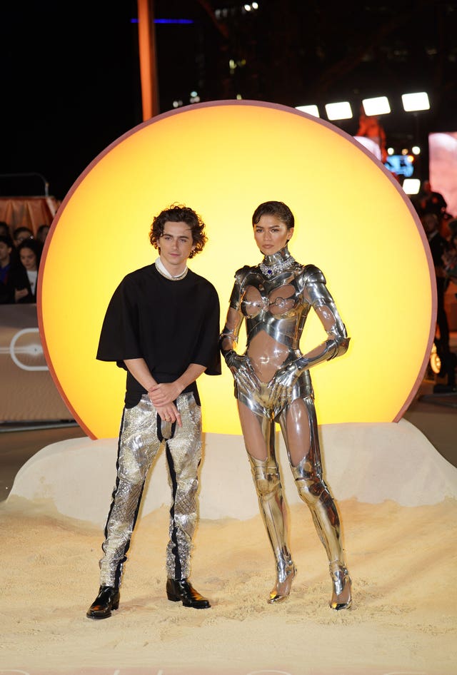 Timothee Chalamet and Zendaya, in a futuristic outfit, arrive for the world premiere of Dune: Part Two