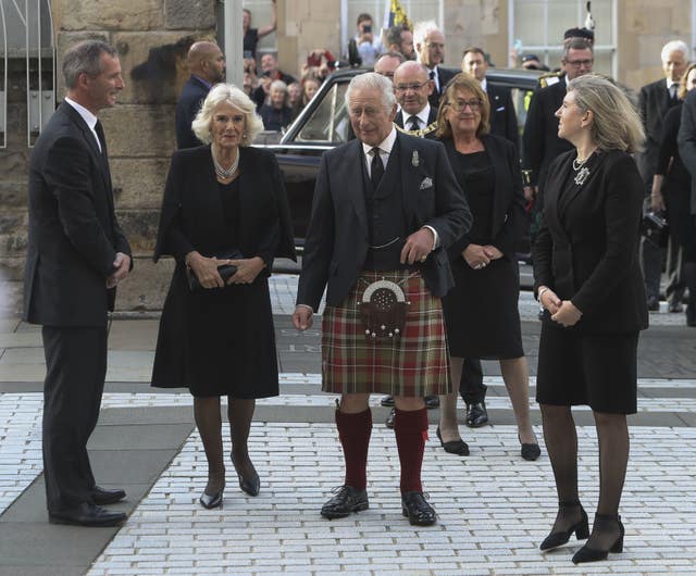 Liam McArthur, the Queen Consort, King and Presiding Officer Alison Johnstone outside the Scottish Parliament