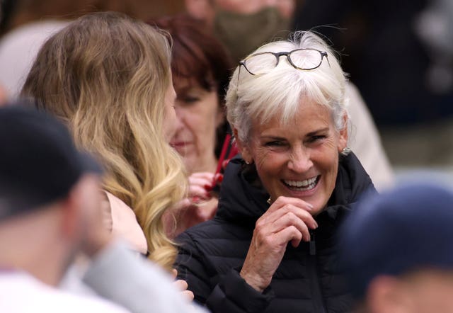 Judy Murray (right) shares a joke with Kim Murray after another difficult evening