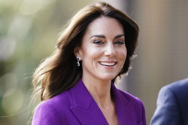 Princess of Wales in a purple suit