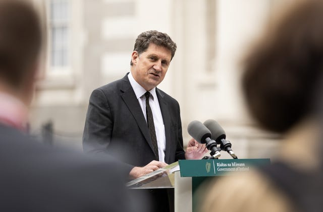 Eamon Ryan speaking from a podium