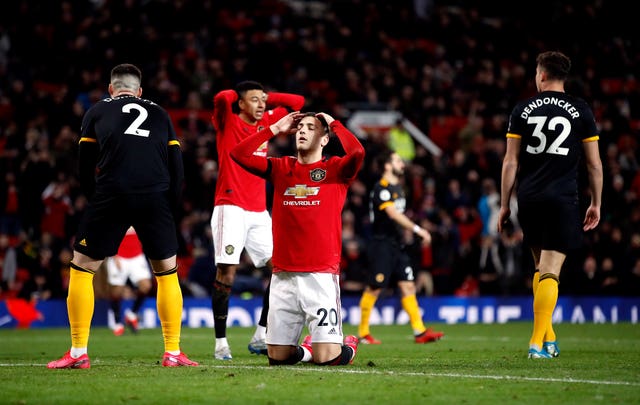 Diogo Dalot reacts to his late miss against Wolves