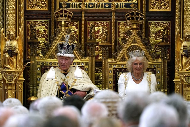 The King reads the King’s Speech in the House of Lords Chamber during the State Opening of Parliament in the House of Lords 