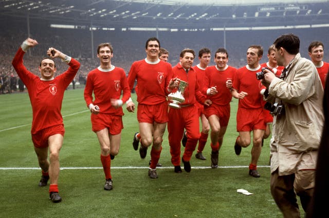 Hunt, second right, celebrates Liverpool's FA Cup final win against Leeds at Wembley in 1965