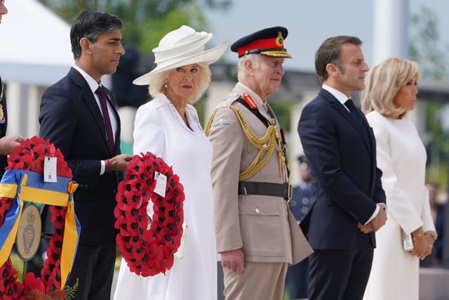 Rishi Sunak, the Queen, the King, President of France Emmanuel Macron and Brigitte Macron during the wreath laying at the UK national commemorative event for the 80th anniversary of D-Day