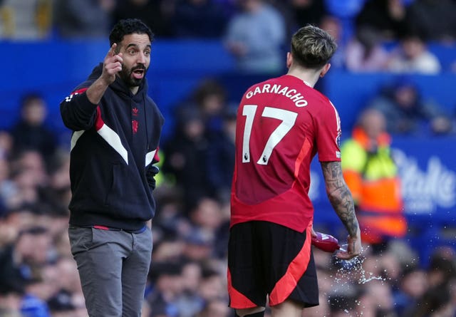 Manchester United head coach Ruben Amorim gestures towards Alejandro Garnacho