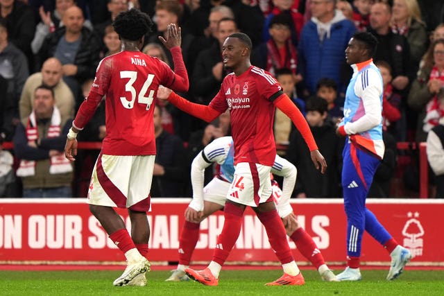 Callum Hudson-Odoi, centre, celebrates his goal with fellow scorer Ola Aina