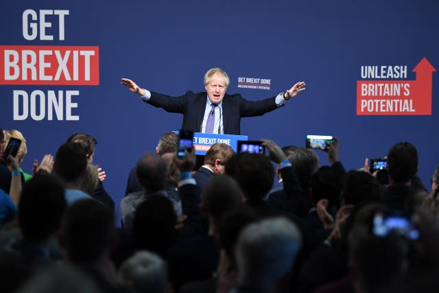 Boris Johnson takes to the stage to launch the Tory manifesto at Telford International Centre in the West Midlands 