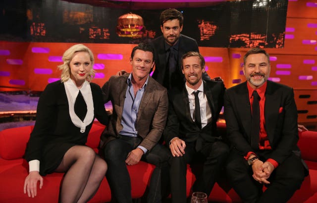 Host Jack Whitehall with (seated left to right) Gwendoline Christie, Luke Evans, Peter Crouch and David Walliams during the filming for the Graham Norton Show 